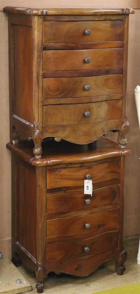 A pair of mahogany four drawer bedside cupboards W.53cm